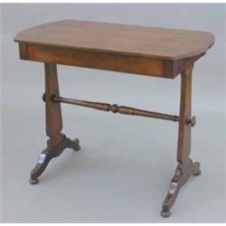 An early Victorian mahogany side table, with drawer on end standards with turned stretcher, 2ft 1...