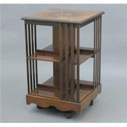 An Edwardian inlaid rosewood two tier revolving bookcase, of square form, 1ft 8ins...
