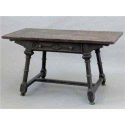 A Victorian oak Gothic design table, with earlier rectangular single plank top over a frieze draw...