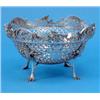 Image 1 : An Edwardian pierced silver fruit basket, with foliate neo-rococo decoration on four scroll feet,...