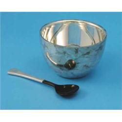 A Gucci white metal caviar bowl and horn spoon, 5ins diam....