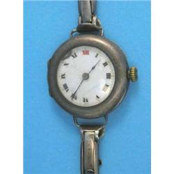 A gentleman's silver Rolex wrist watch with enamelled Roman dial, circa 1915....