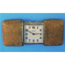 A Movado silver gilt and shagreen travelling watch....