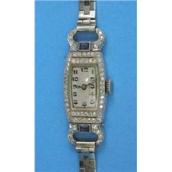 An Art Deco platinum, diamond and sapphire cocktail watch with Arabic dial and later 9ct white go...