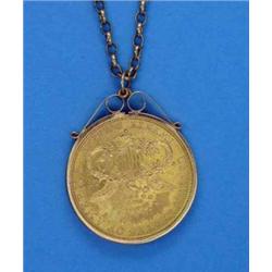 An American 1890 twenty dollar, in 9ct gold pendant frame with gold chain...