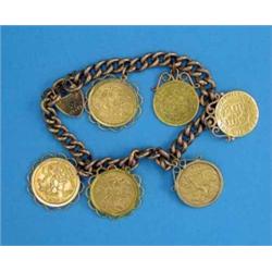 A 9ct gold curb link bracelet, mounted with five half sovereigns, and a South African half pond...