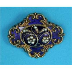 A Victorian gilt metal blue enamelled brooch, applied with a diamond and pearl floral spray withi...