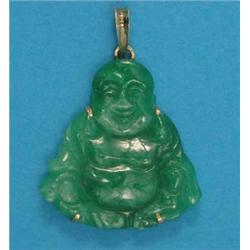 A modern Chinese jade pendant, carved with a seated buddha...