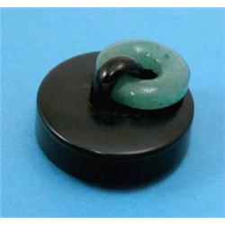 A Cartier Art Deco circular pill box, with jade ring-pull, black enamel on 925 standard silver, N...