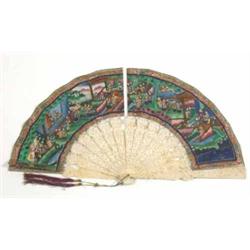 A Cantonese fan, having carved ivory guards depicting figures in a garden landscape, carved and p...