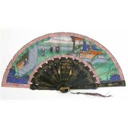 A Cantonese fan, having gilded black lacquered sticks and guards and a painted paper leaf depicti...