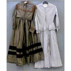 A Victorian pale grey sprigged cotton dress, having boned, ruched and corded bodice and peplum an...