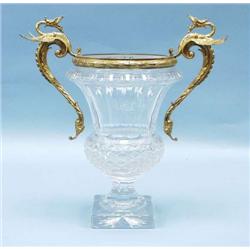 An antique French cut crystal vase with ormol...