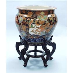 An antique Japanese Imari porcelain jardinier...