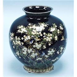 A fine Japanese cloisonne vase. The globular...