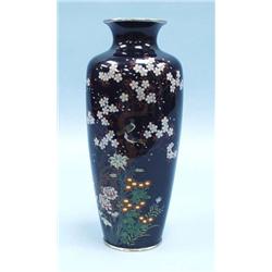 An antique Japanese cloisonne vase. The balus...