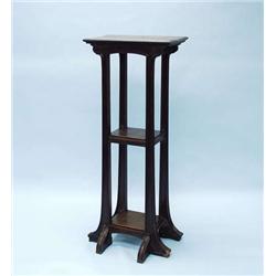 ART NOUVEAU - A tall walnut pedestal in taste...
