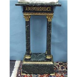 An antique French gilt bronze mounted green m...