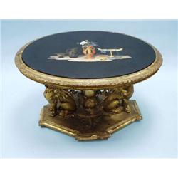 A large antique gilt wood and pietra dura ova...