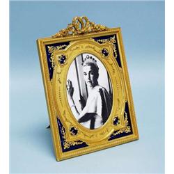 A good French gilt bronze and enamel easel pi...