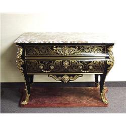 An antique French Louis XVI style ebony wood...