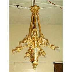 A large antique French bronze dore chandelier...
