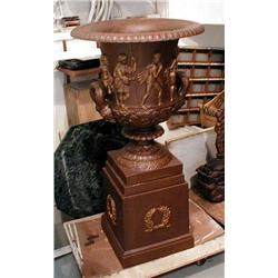 A Campagna form cast iron urn with matching p...