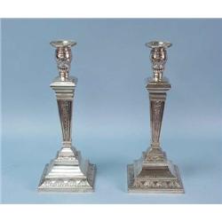 A pair of Empire style sterling silver candle...