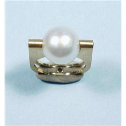 An 18 kt. gold modernist ring. A central Sout...