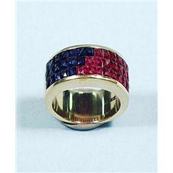 A fine 18 kt. gold, ruby and sapphire ring. D...