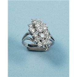 An 18 kt. white gold cocktail ring. Raised mo...