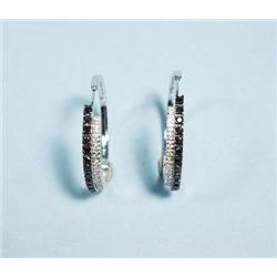 A pair of attractive 18 kt. white gold and di...