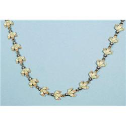 An 18 kt. yellow gold and diamond necklace. D...