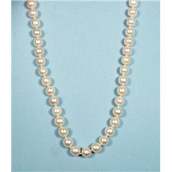 A fine 8-8.5 mm. cultured pearl necklace with...