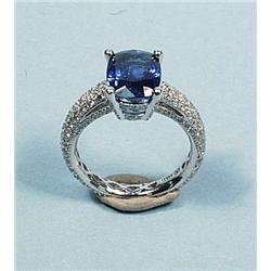 An elegant platinum and diamond ring set with...