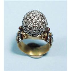 A handmade 18 kt. and 22 kt. yellow gold ring...