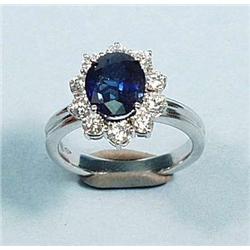 A classical design sapphire and diamond ring....