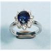 Image 1 : A classical design sapphire and diamond ring....