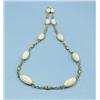 Image 1 : A Van Cleef design 18 kt. gold and ivory chai...