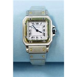 CARTIER, FRANCE - A ladies Santos 18 kt. gold...