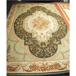 An Aubusson design wool carpet. 10' x 14'.  6...