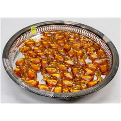 SERVING DISH FULL OF DECORATIVE PIECES