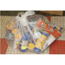 GARBAGE BAG FULL OF ASSORTED PRINGLES