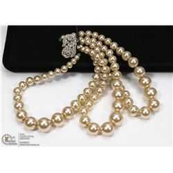 3 STRAND PEARL BRACELET WITH S-CLASP.