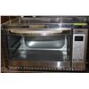 Image 1 : #37-TOASTER OVEN ,BAKER,BROILS (OSTER)