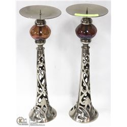 2 CHROMEAND GLASS CANDLE HOLDERS
