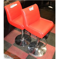 PAIR OF RED LEATHERETTE SWIVEL BAR STOOLS