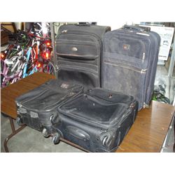 FOUR SUITCASES