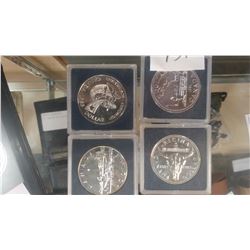 LOT OF FOUR SILVER DOLLARS