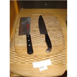 2 CUTTING BOARDS AND 2 HENKEL KNIVES